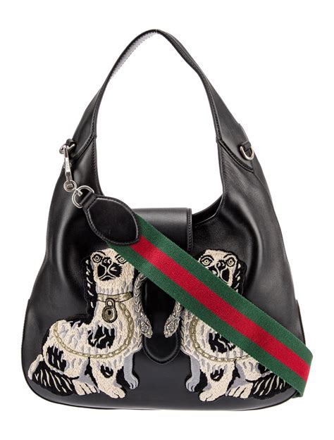 dog in gucci handbag